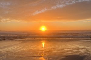 The sun setting over the Pacific Ocean