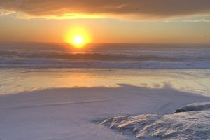 The sun setting over the Pacific Ocean