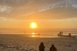 The sun setting over the Pacific Ocean